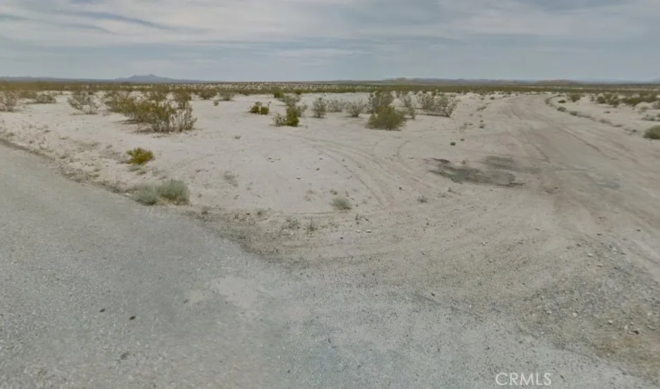 a view of beach and lake