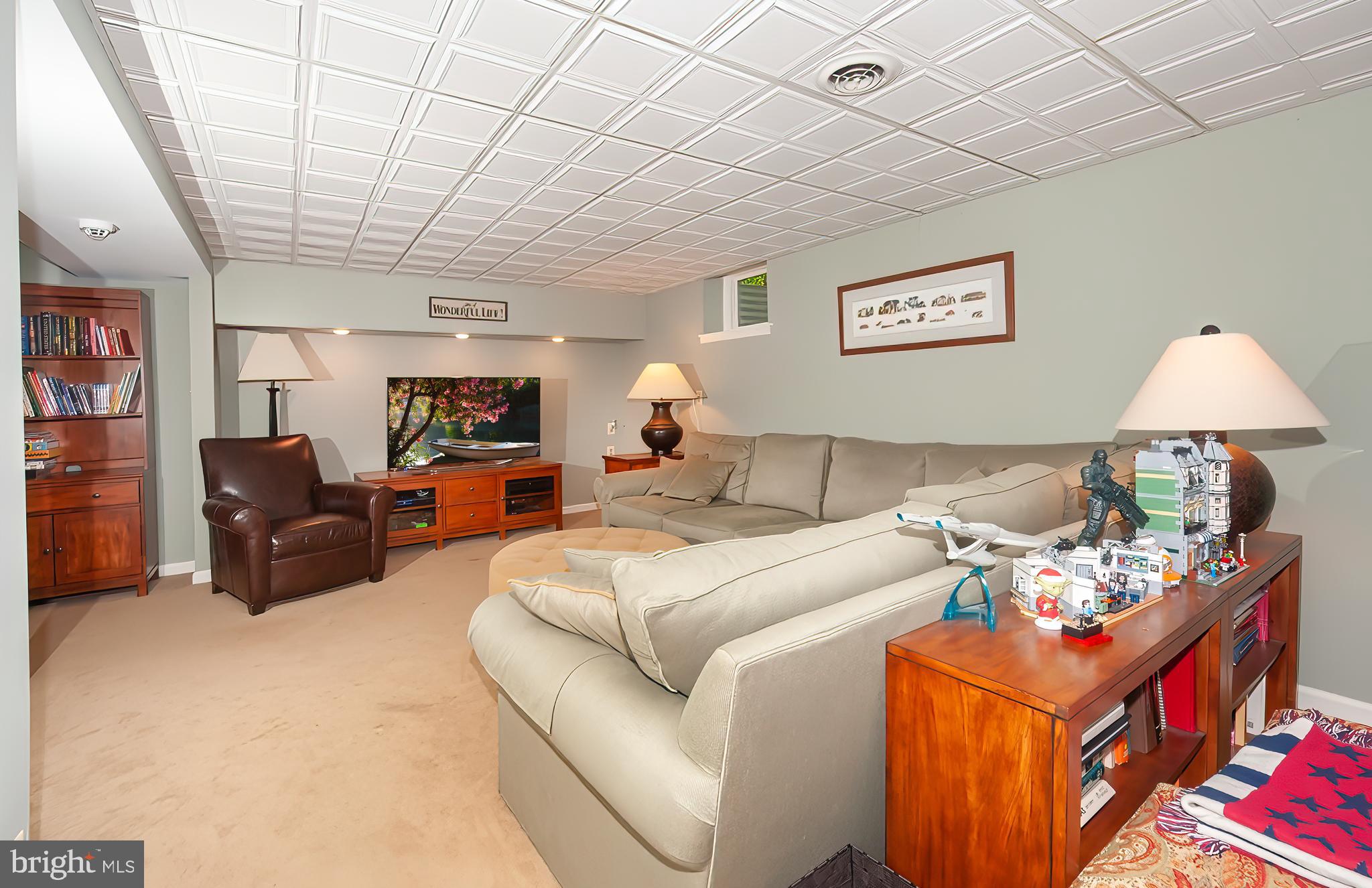2 Ringneck Lane Wayne, PA 19087 - Photo 36 of 42 a living room with furniture a couch and a chandelier