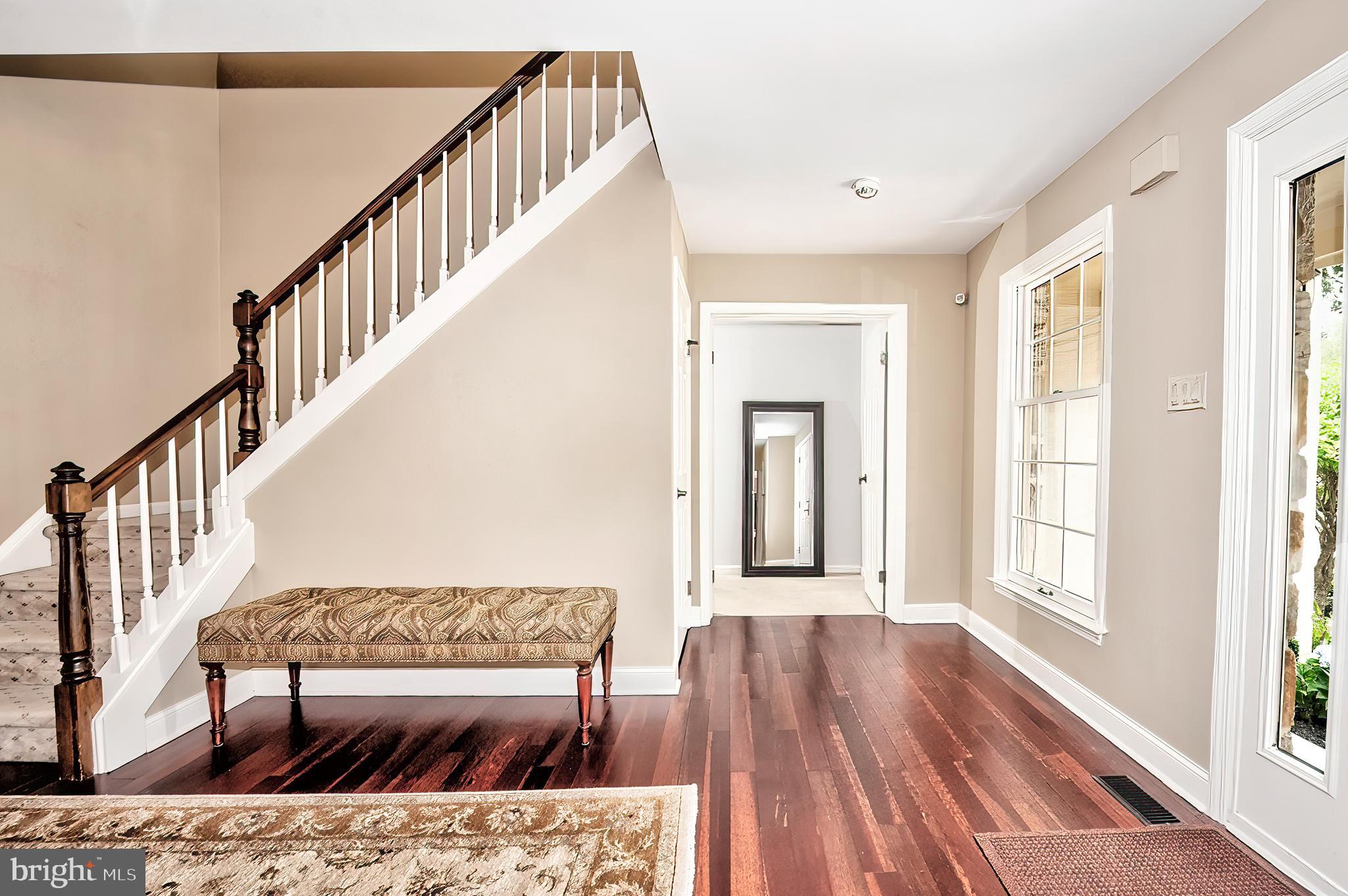 2 Ringneck Lane Wayne, PA 19087 - Photo 10 of 42 a living room with wooden floor and a table