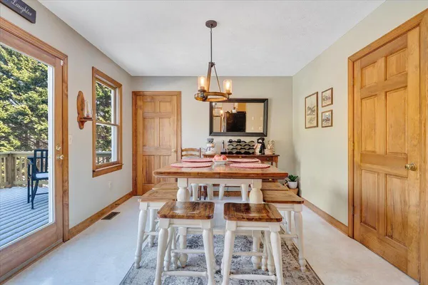 a view of a livingroom with furniture and window