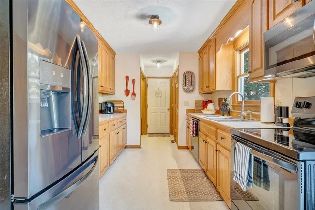 a large kitchen with cabinets