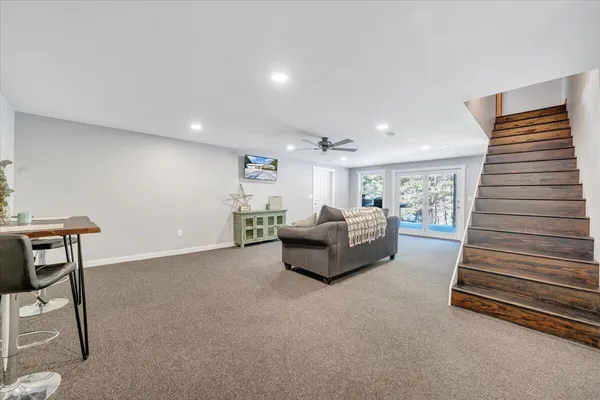 a view of a room with gym equipment and a window