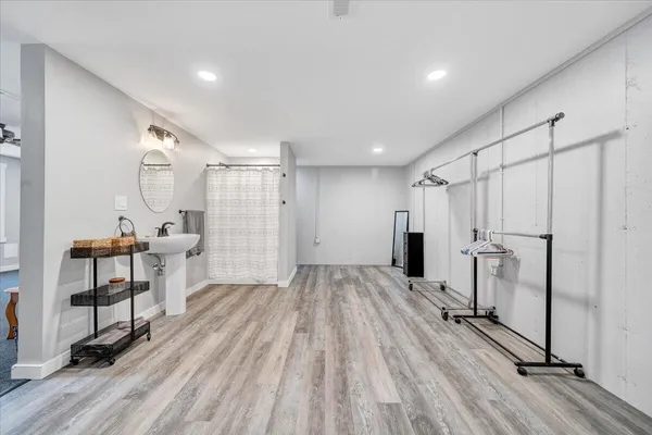 a view of balcony with furniture and wooden deck