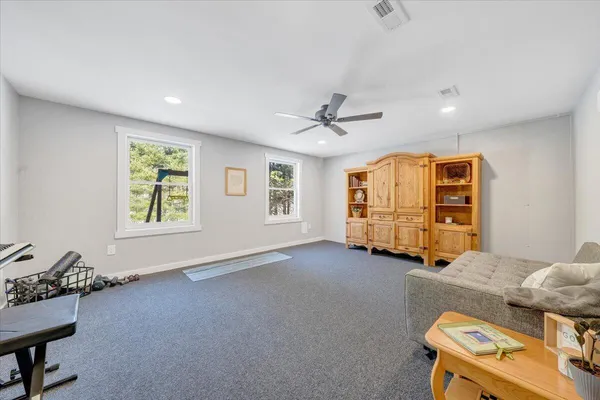 a view of a chairs on the roof deck