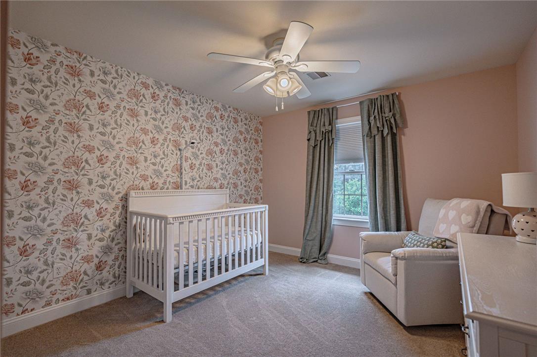 6000 Pond View Terrace Bath, PA 18014 - Photo 41 of 69 A comforting retreat, this bedroom offers carpet flooring and a ceiling fan, creating an inviting atmosphere.
