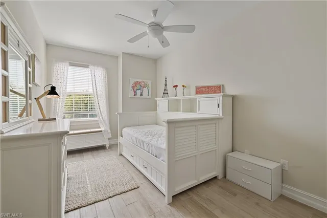 a room with a bed and a window