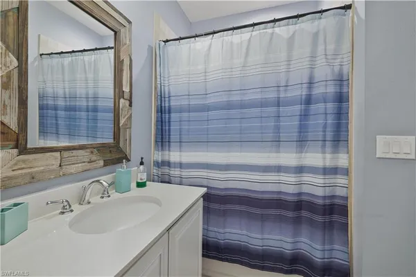 a bathroom with a sink and a bathtub