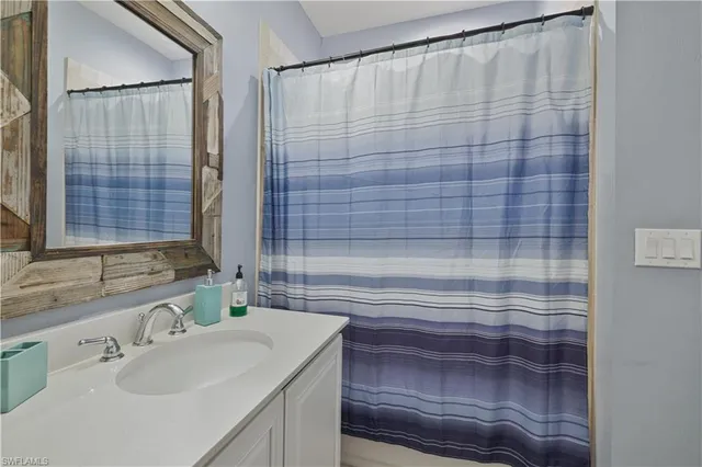 a bathroom with a sink and a bathtub