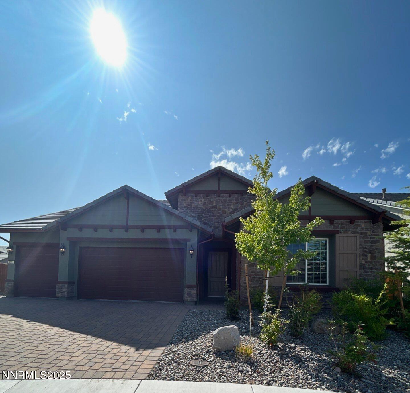 9515 Baldacci Court Reno, NV 89521 - Photo 1 of 27 a front view of a house with plants