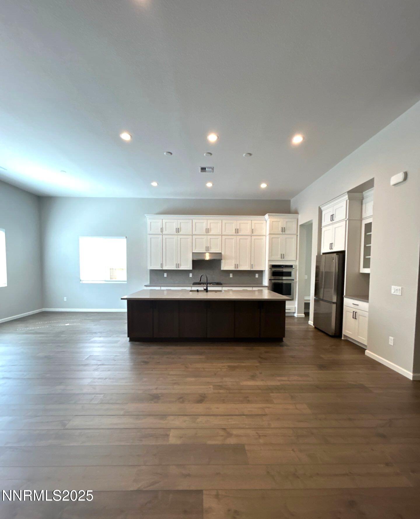 9515 Baldacci Court Reno, NV 89521 - Photo 2 of 27 a view of kitchen with refrigerator and window