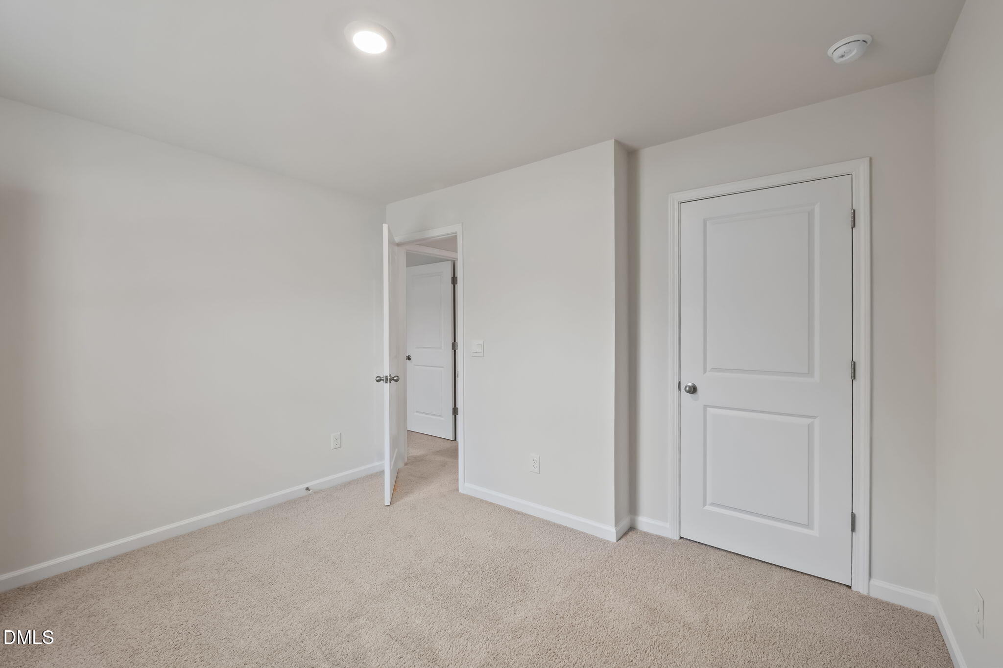 2113 Fletchers Ridge Drive Durham, NC 27703 - Photo 26 of 54 a view of an empty room and closet area