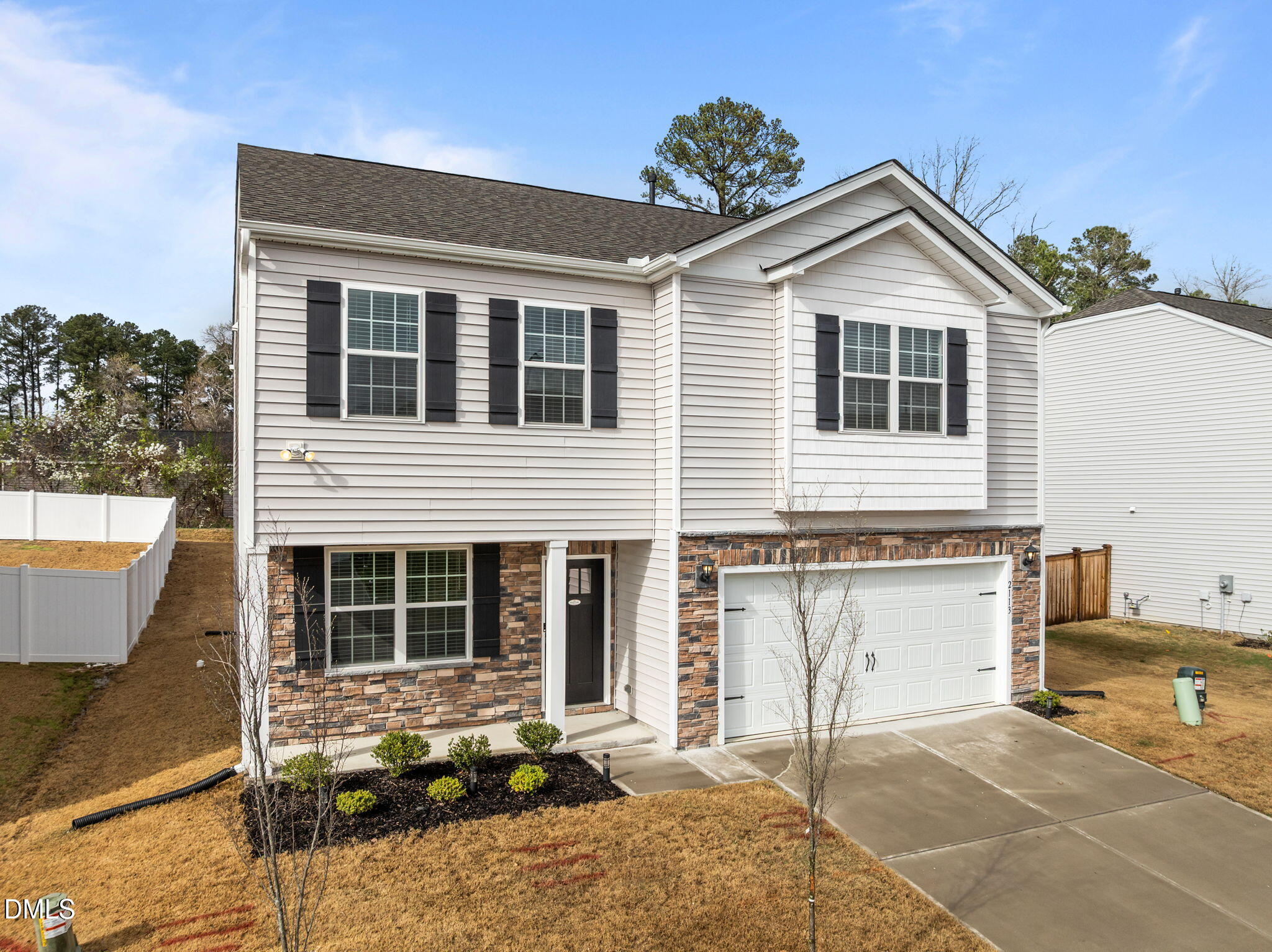 2113 Fletchers Ridge Drive Durham, NC 27703 - Photo 3 of 54 a front view of a house with a porch