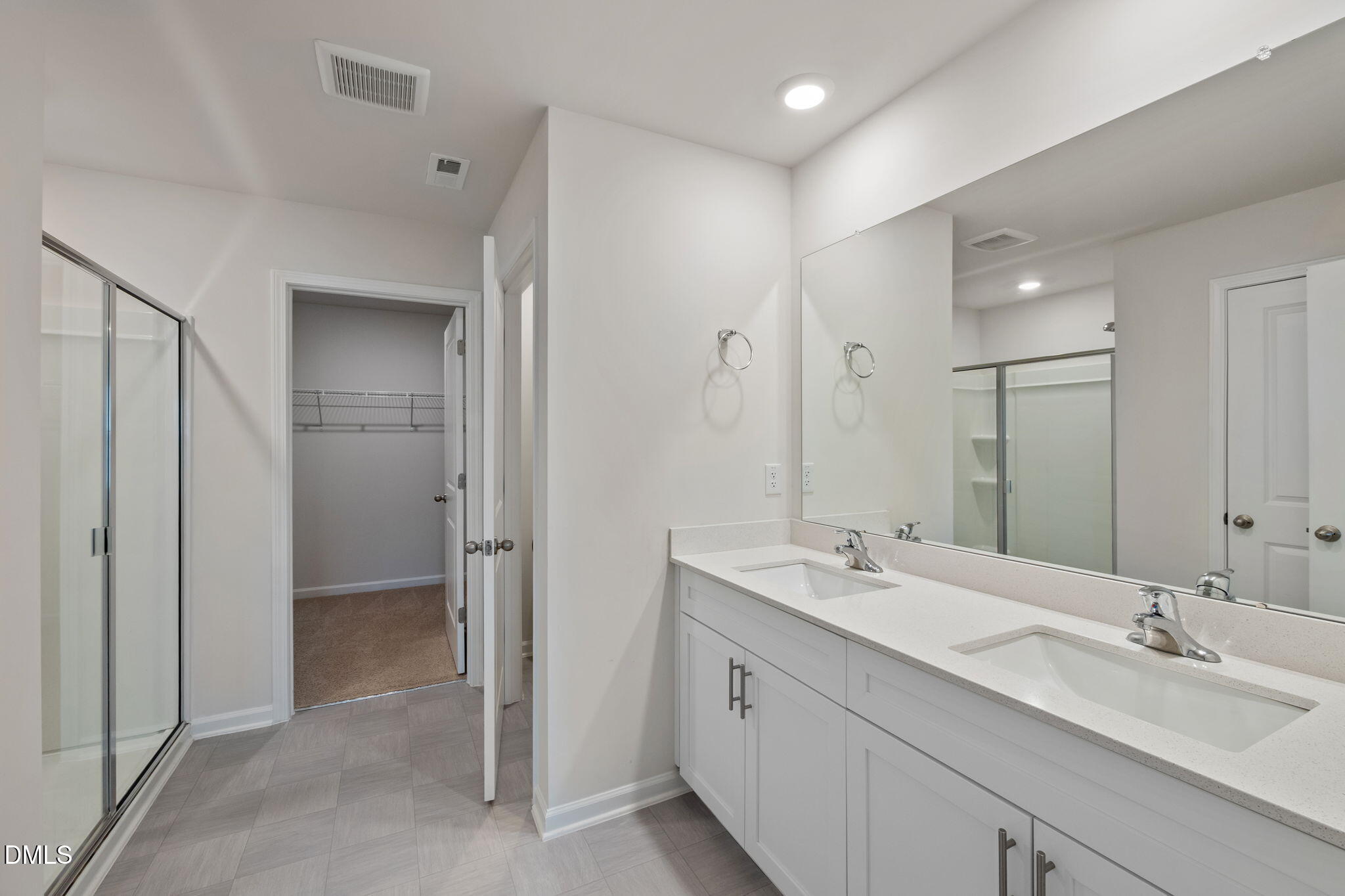 2113 Fletchers Ridge Drive Durham, NC 27703 - Photo 33 of 54 a bathroom with a double vanity sink mirror and double
