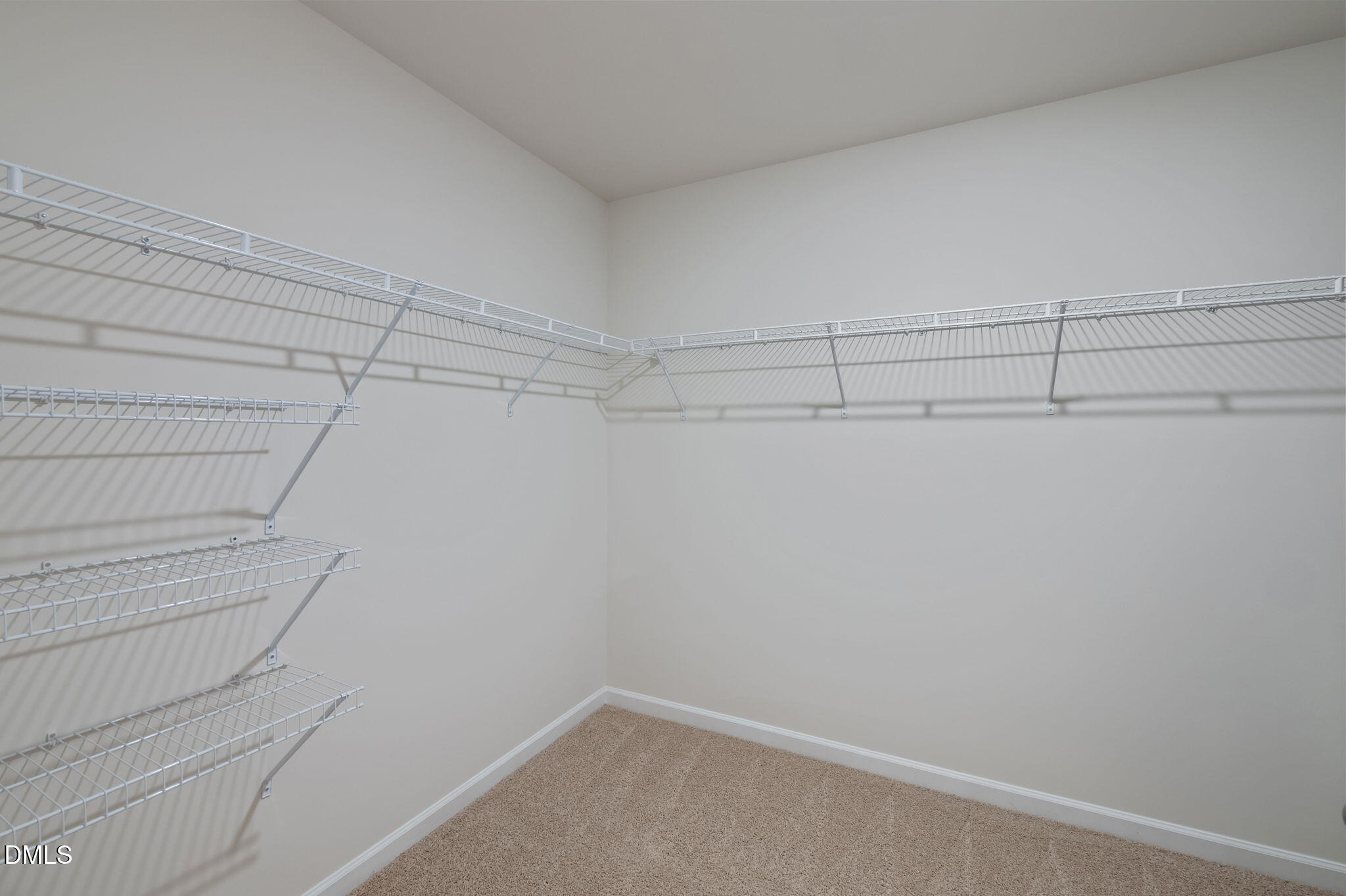 2113 Fletchers Ridge Drive Durham, NC 27703 - Photo 34 of 54 a view of a room with racks on the wall