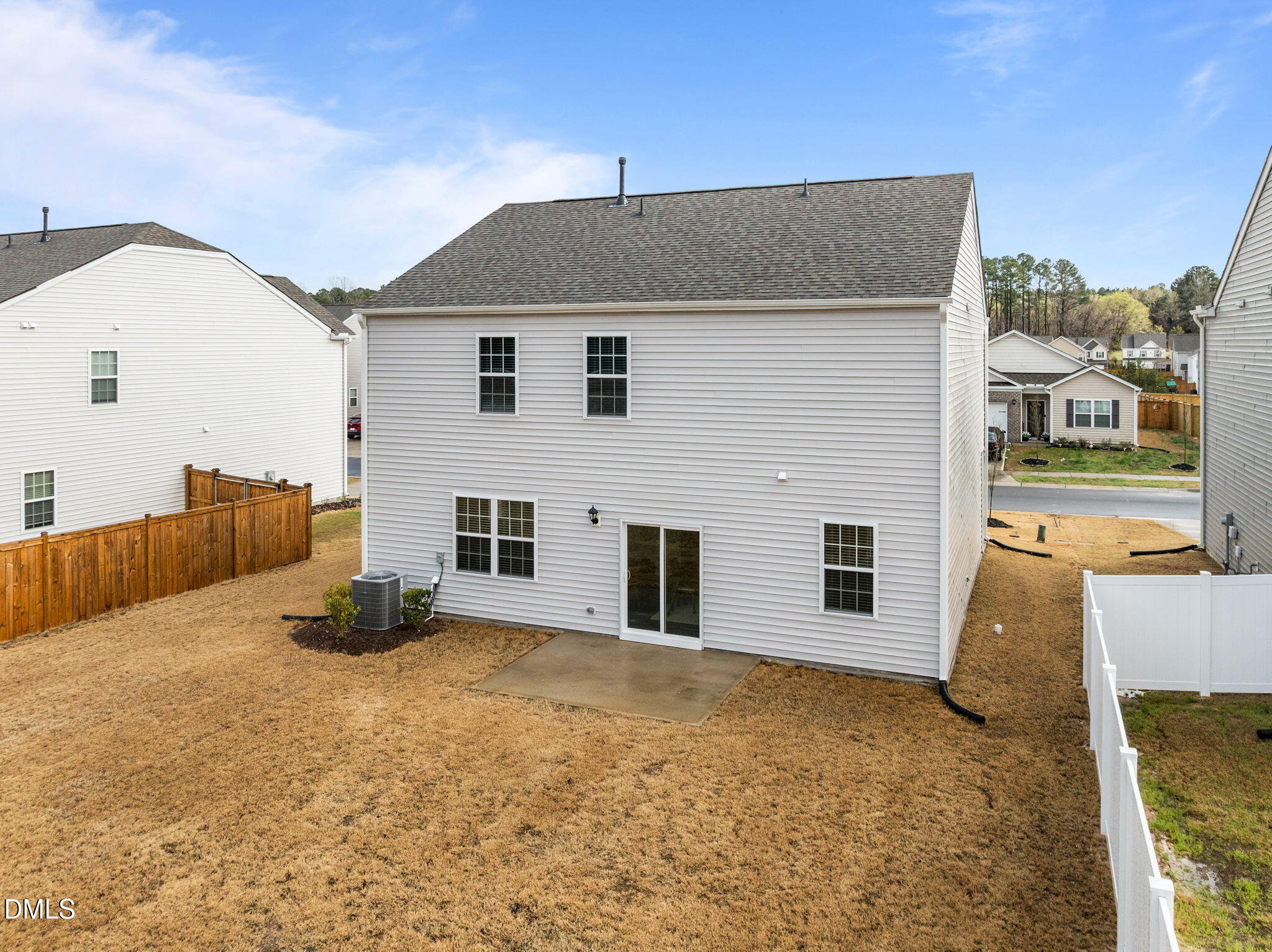 2113 Fletchers Ridge Drive Durham, NC 27703 - Photo 38 of 54 a front view of a house with a yard