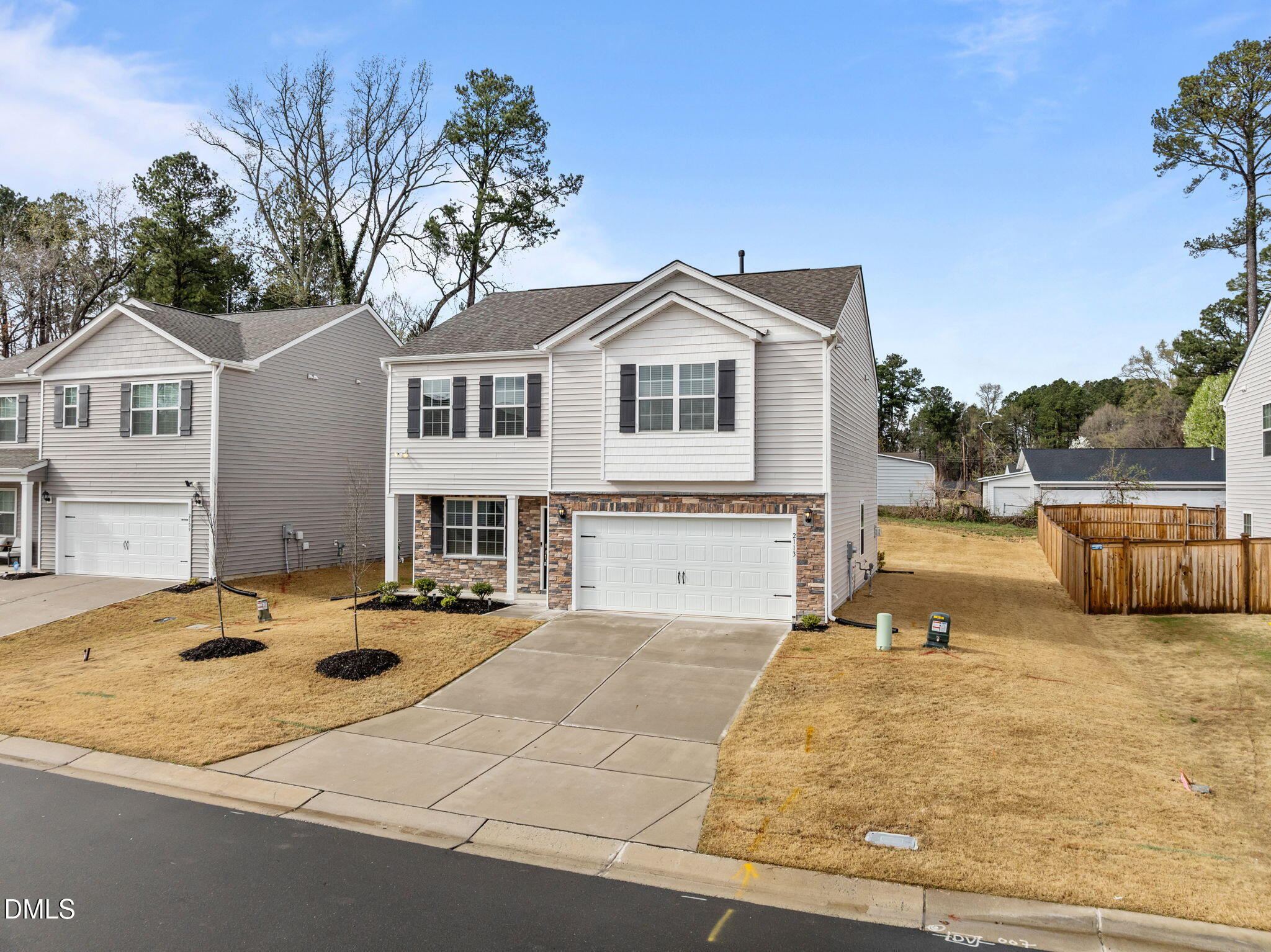 2113 Fletchers Ridge Drive Durham, NC 27703 - Photo 54 of 54 a front view of a house with a yard