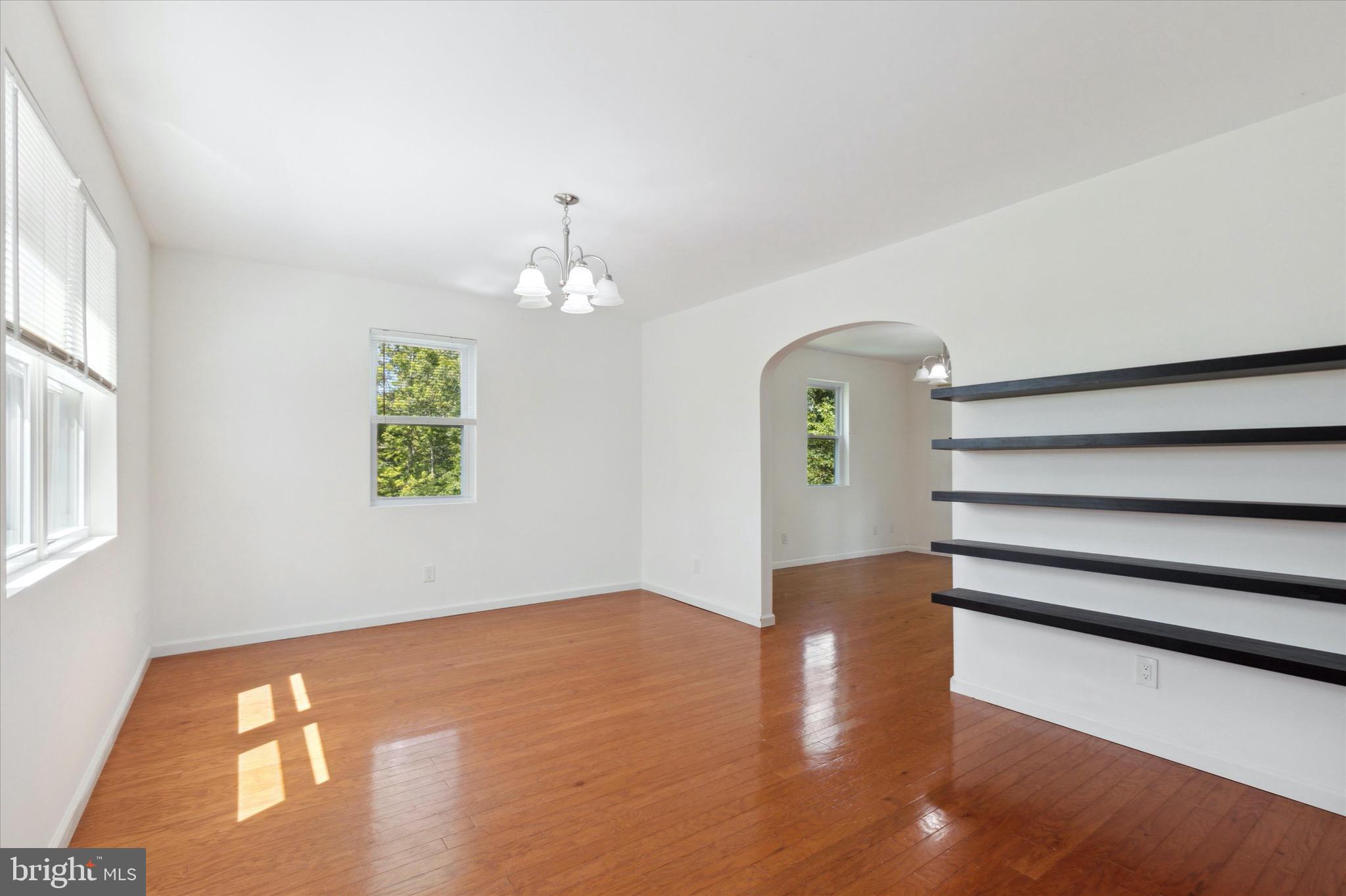 997 Camp Road Telford, PA 18969 - Photo 15 of 25 a view of empty room with wooden floor and window