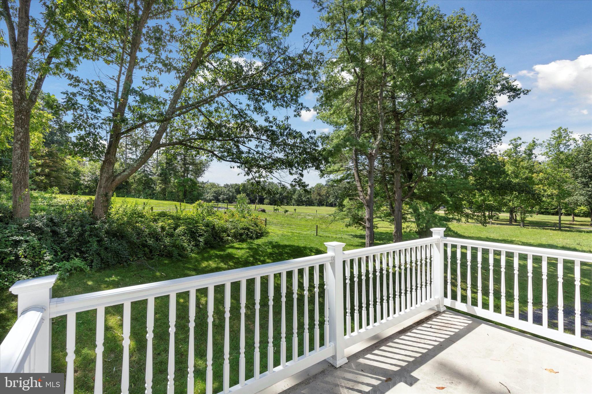 997 Camp Road Telford, PA 18969 - Photo 23 of 25 a balcony with wooden floor and fence