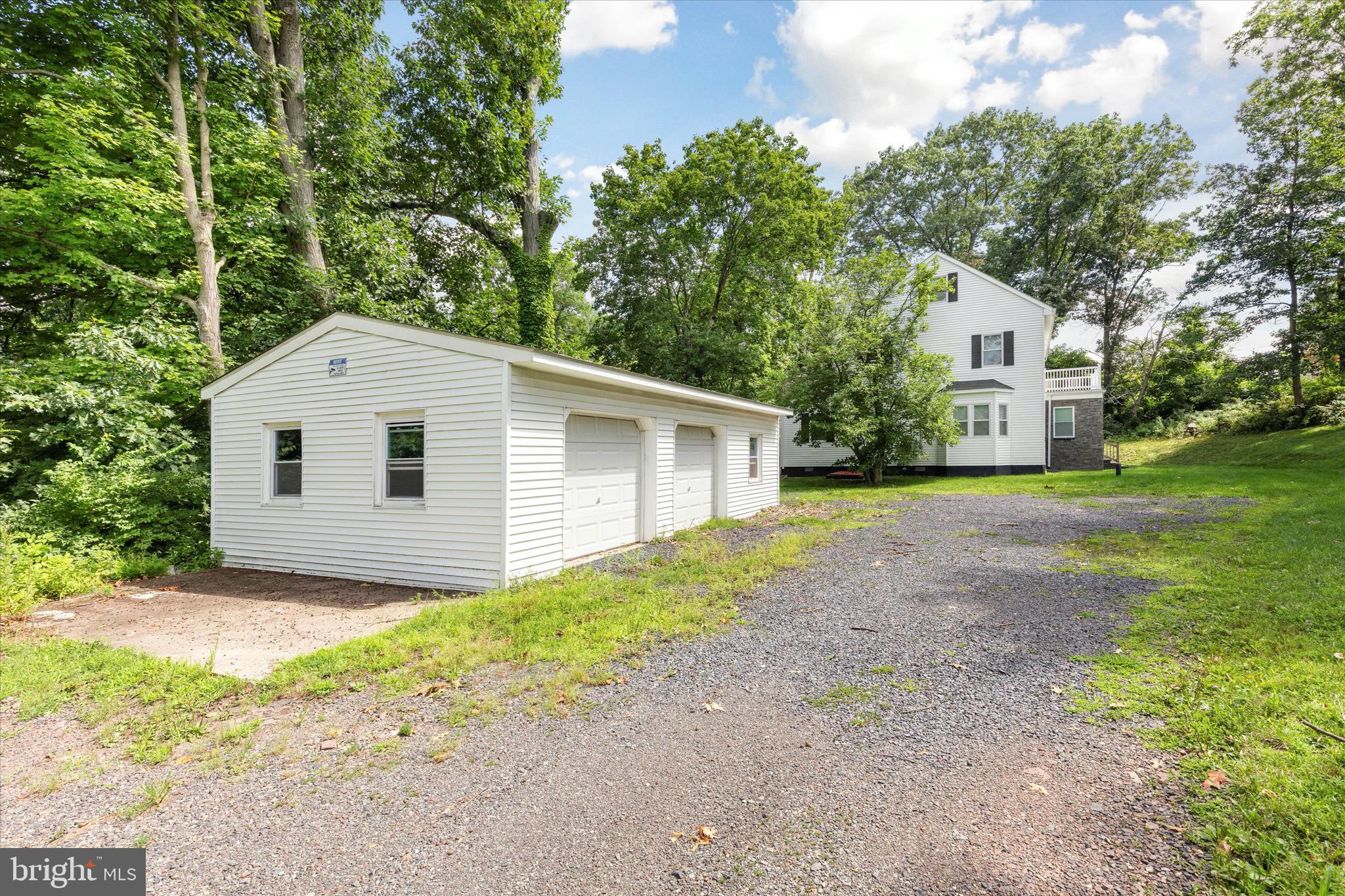 997 Camp Road Telford, PA 18969 - Photo 24 of 25 a front view of house with yard and trees