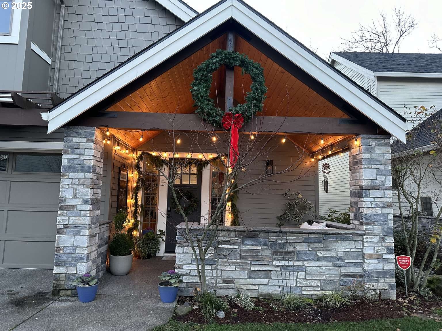7535 Northwest Quinault Street Camas, WA 98607 - Photo 16 of 27 a view of people sitting in front of building