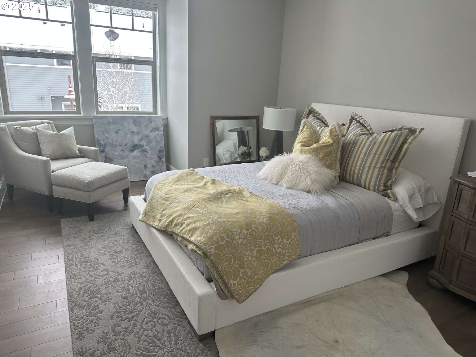 7535 Northwest Quinault Street Camas, WA 98607 - Photo 17 of 27 a bedroom with a bed and glass window