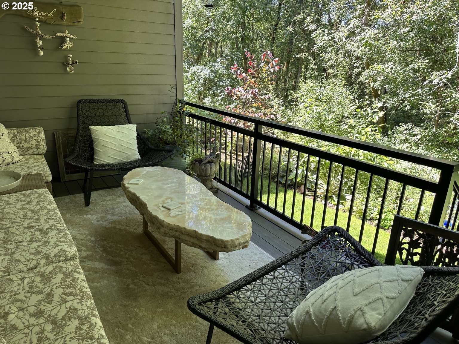 7535 Northwest Quinault Street Camas, WA 98607 - Photo 3 of 27 a balcony with table and chairs