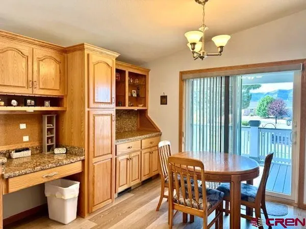 a bedroom with a bed and a cabinets