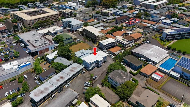 an aerial view of a city with lots of residential buildings