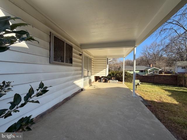 8909 Keewatin Road Lanham, MD 20706 - Photo 18 of 18 a view of swimming pool with outdoor seating