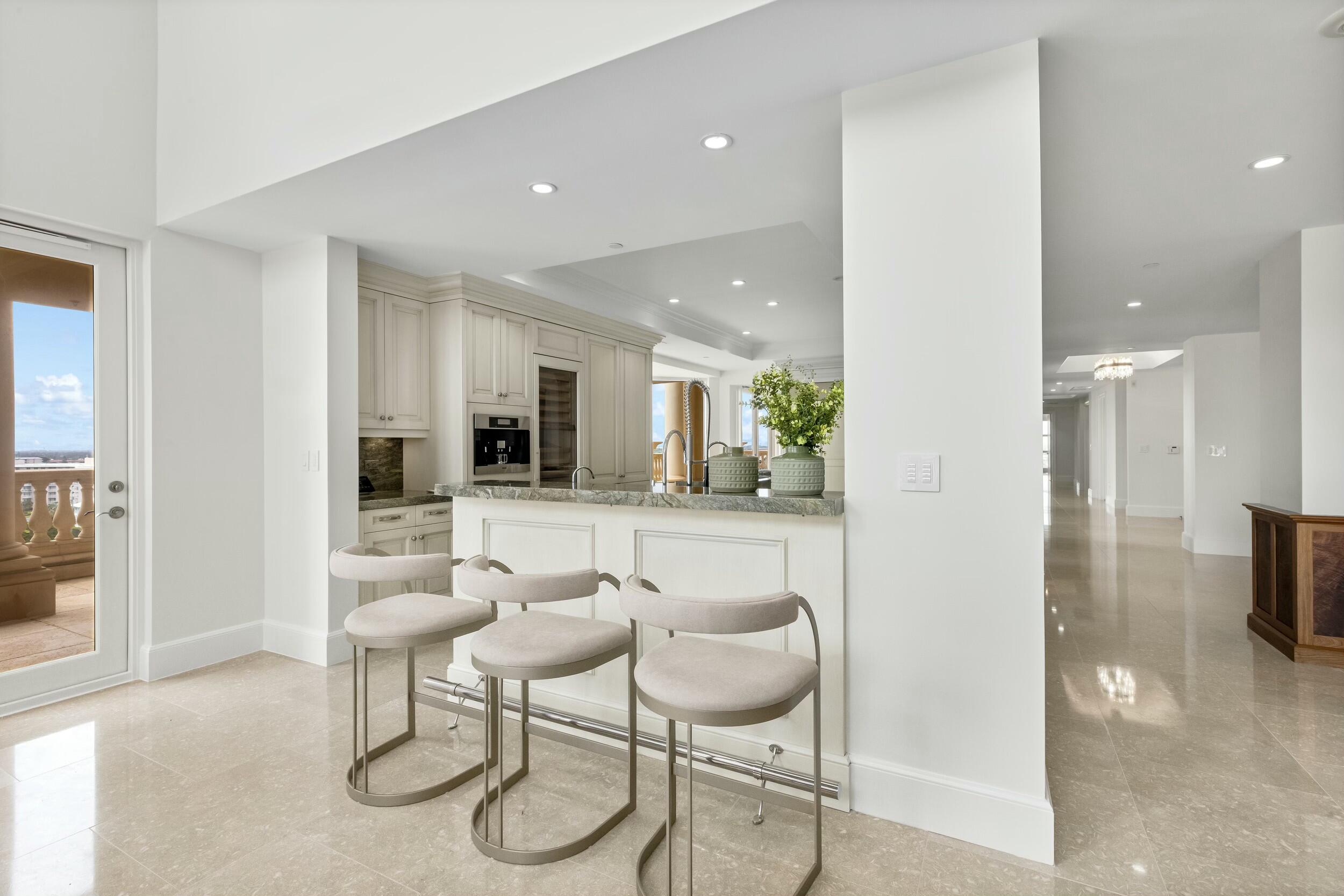2500 South Ocean Boulevard, Unit 903 Boca Raton, FL 33432 - Photo 14 of 66 a dining room with furniture and a view of living room