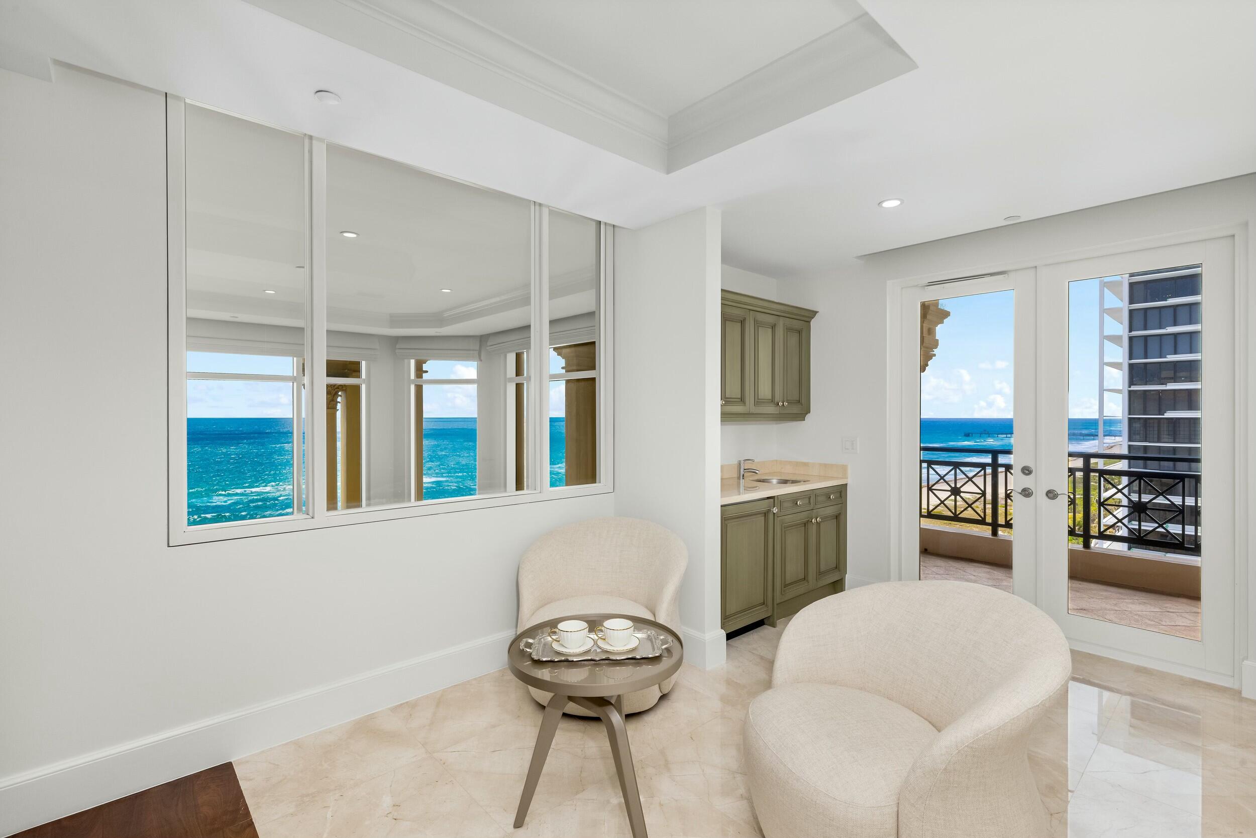 2500 South Ocean Boulevard, Unit 903 Boca Raton, FL 33432 - Photo 40 of 66 a living room with furniture and a large window