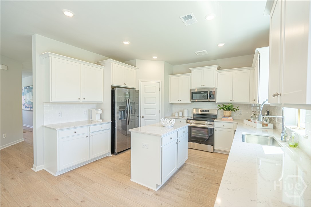 766 Blue Moon Crossing Pooler, GA 31322 - Photo 4 of 34 *Model home photography is for reference purposes only. Does not depict actual home.