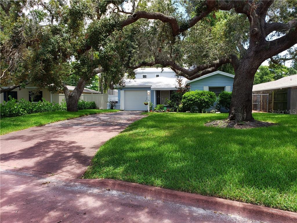 Lovely Oak tree shaded deep lot in Prime Location on The Pink Streets of St. Petersburg!