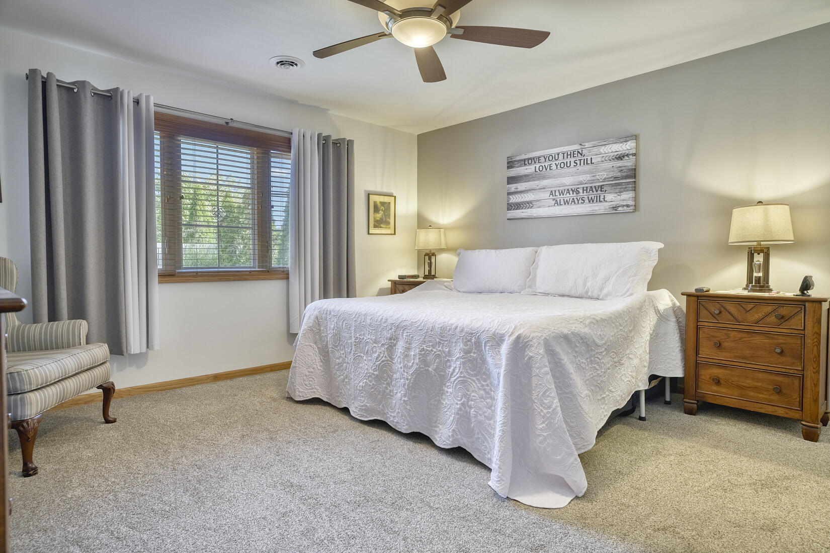 9815 Hart Street St. John, IN 46373 - Photo 12 of 19 a bedroom with a bed and a chandelier