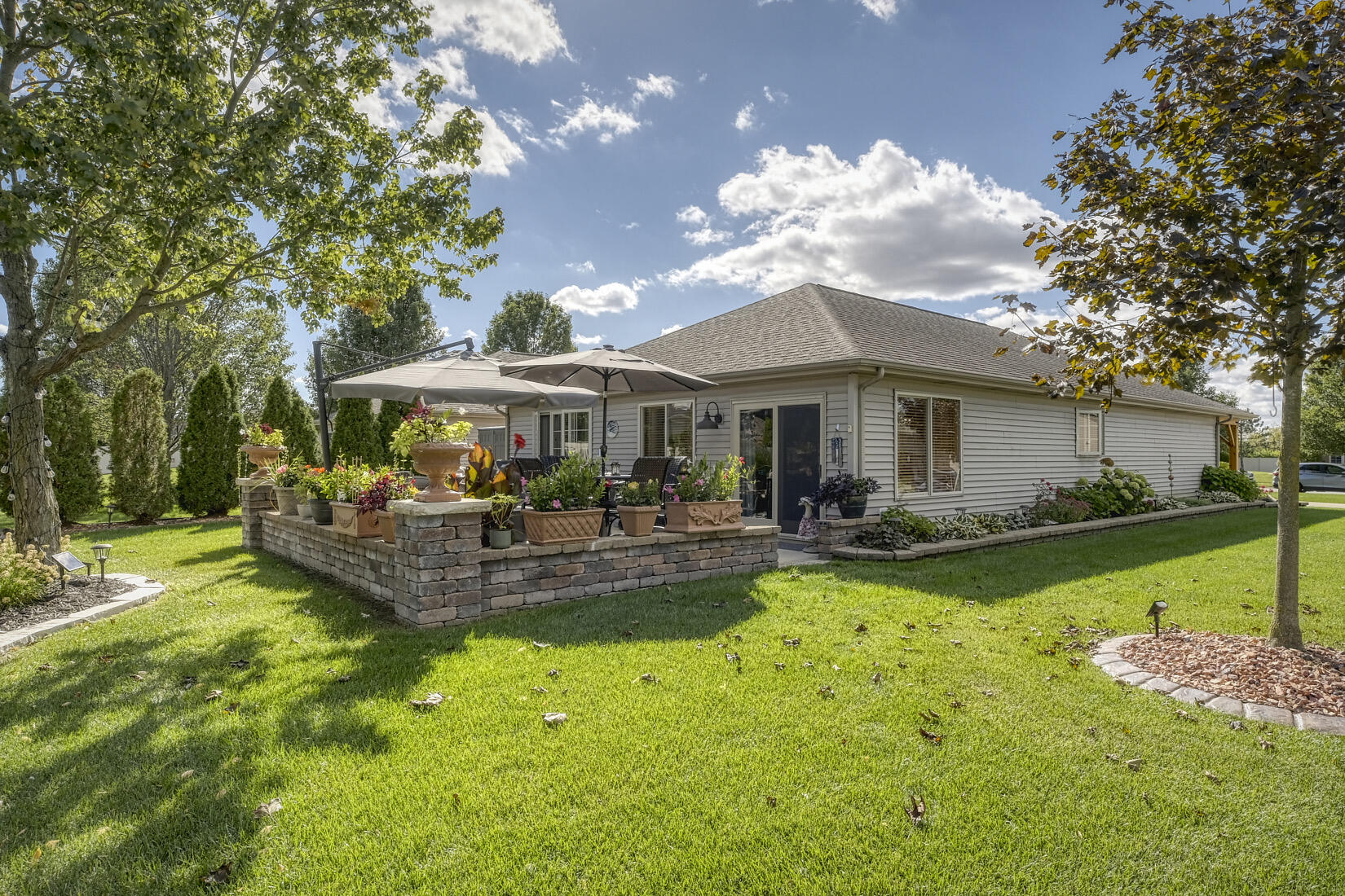 9815 Hart Street St. John, IN 46373 - Photo 2 of 19 a view of a house with a yard patio and swimming pool