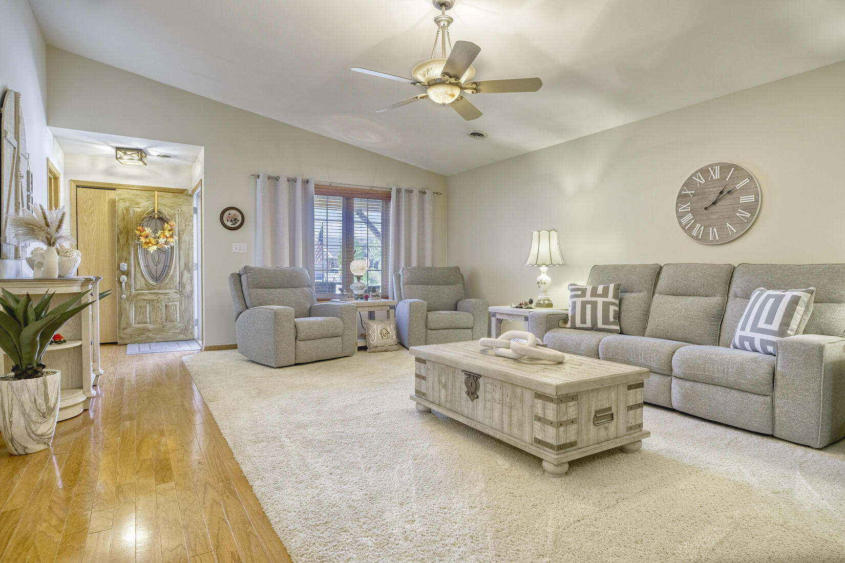 9815 Hart Street St. John, IN 46373 - Photo 5 of 19 a living room with furniture and a chandelier