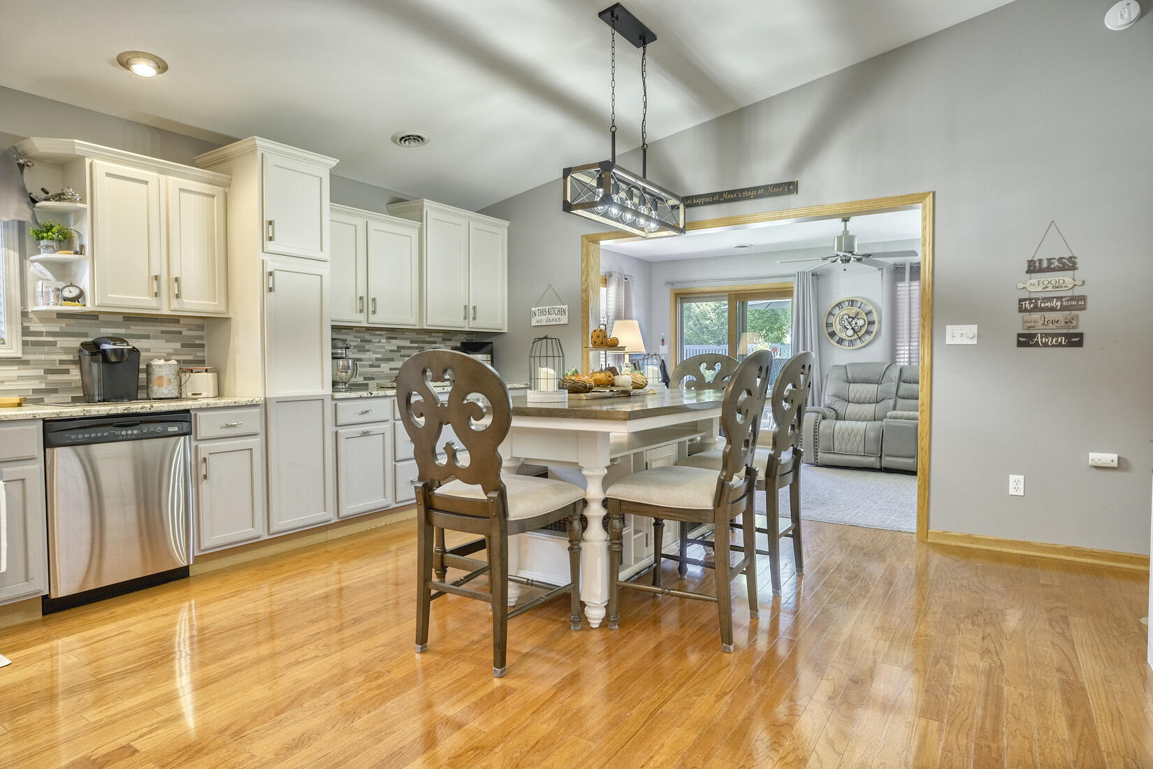 9815 Hart Street St. John, IN 46373 - Photo 8 of 19 a view of a dining room with furniture and wooden floor