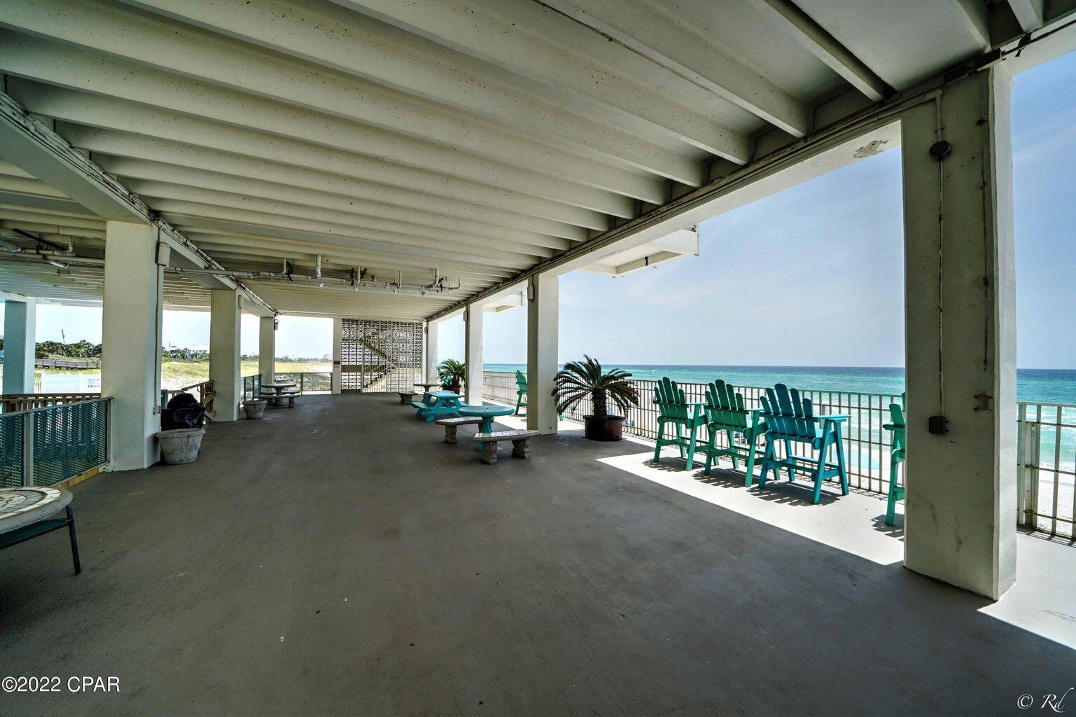 14401 Front Beach Road, Unit 434 Panama City Beach, FL 32413 - Photo 20 of 36 a view of a porch with furniture