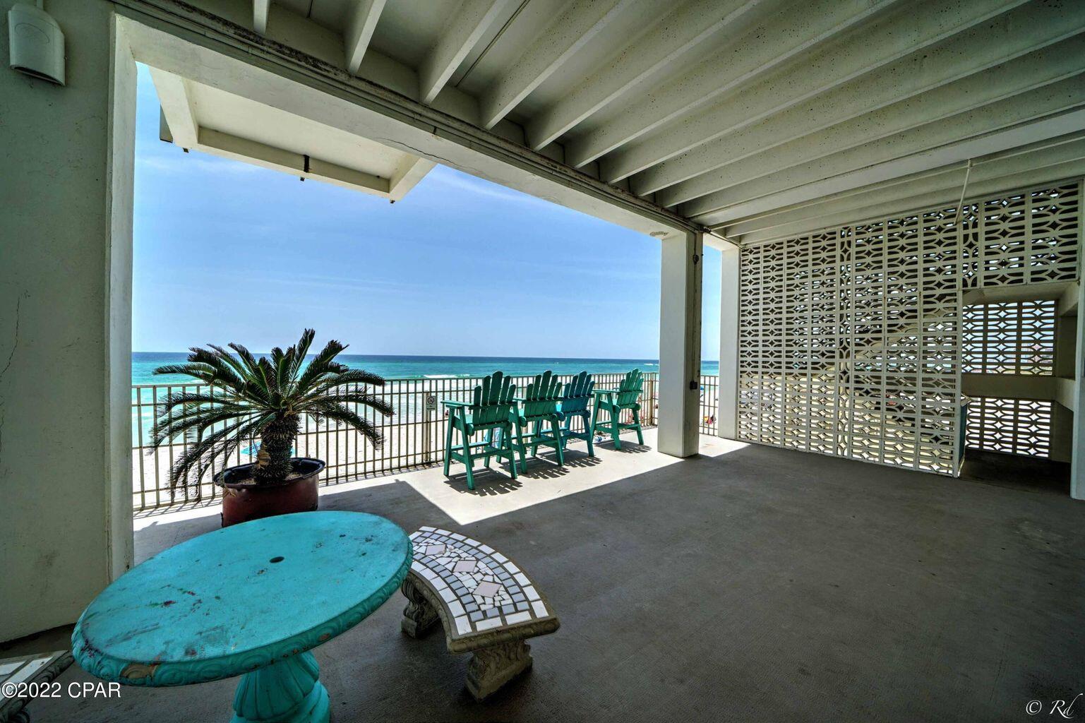 14401 Front Beach Road, Unit 434 Panama City Beach, FL 32413 - Photo 21 of 36 a view of a porch with furniture