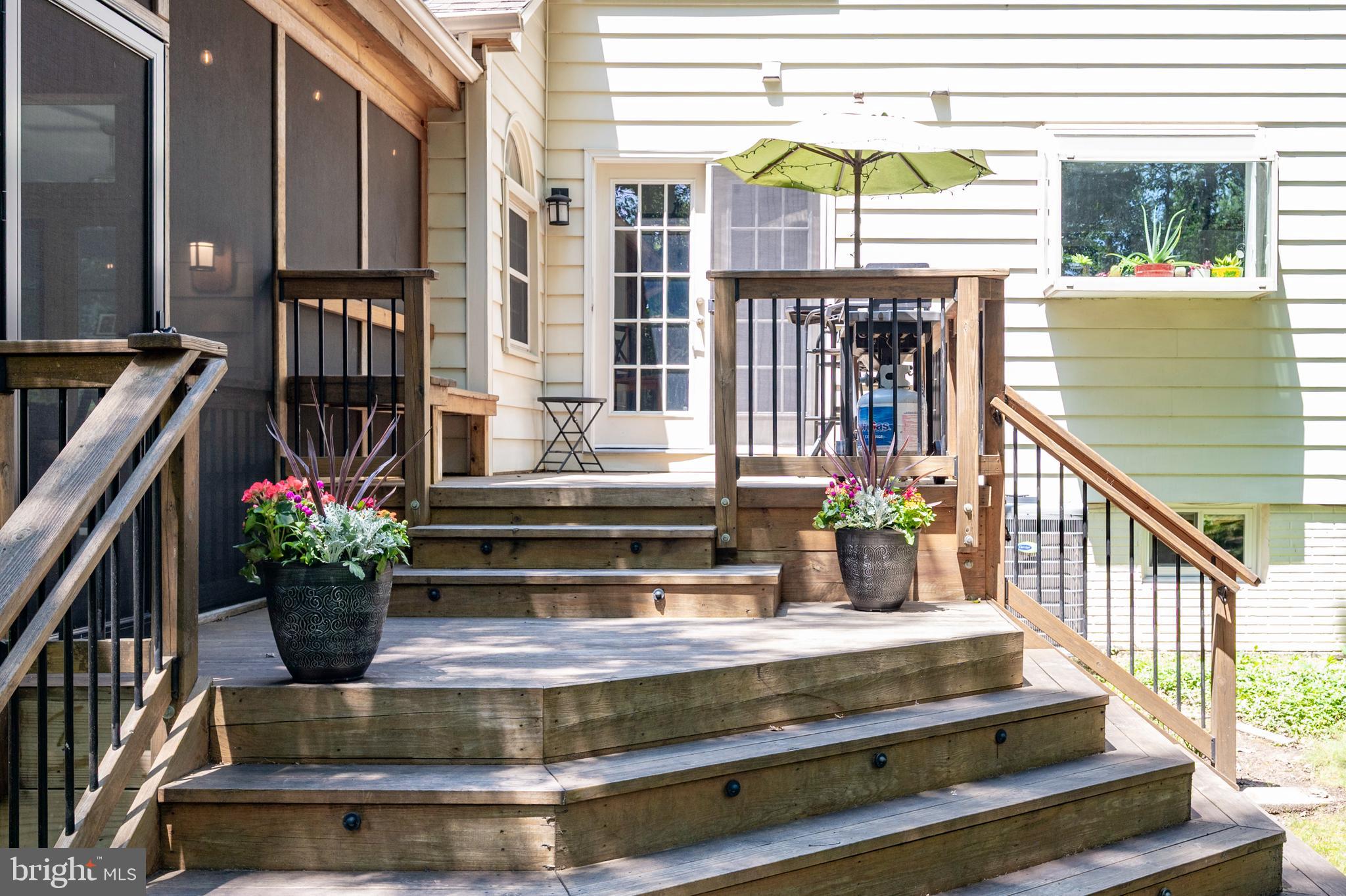 6909 Trillium Lane Springfield, VA 22152 - Photo 13 of 36 a view of lobby with a chair and potted plants