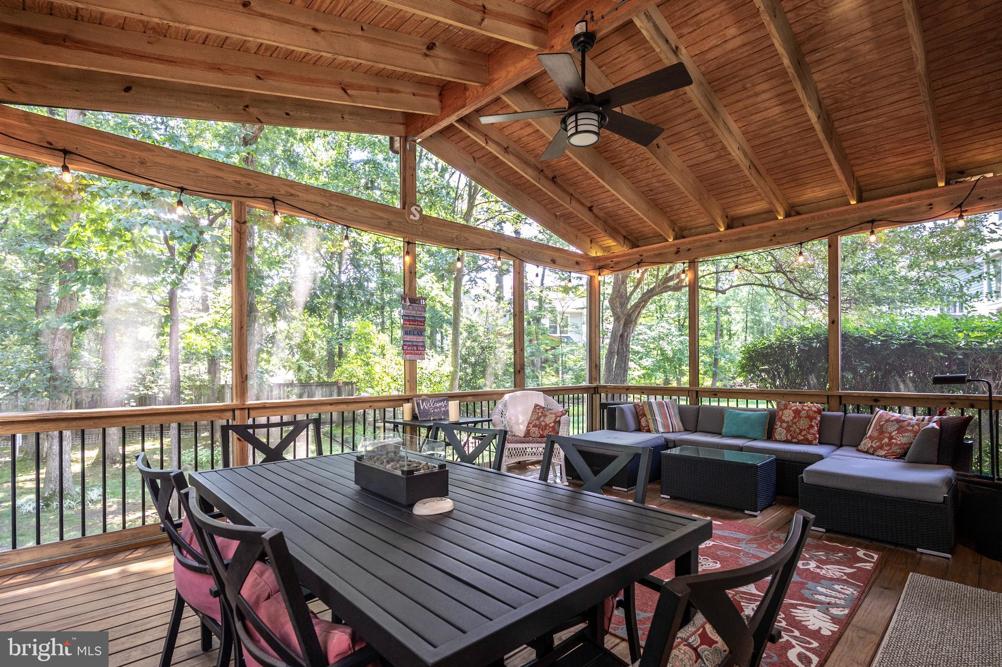 6909 Trillium Lane Springfield, VA 22152 - Photo 6 of 36 a view of a dining room with furniture window and outside view