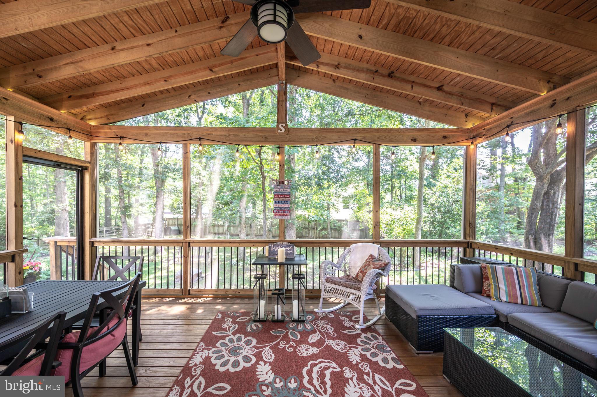 6909 Trillium Lane Springfield, VA 22152 - Photo 7 of 36 a living room with furniture and a large window