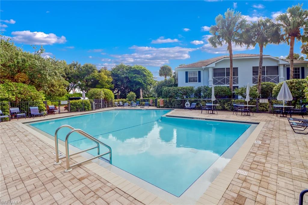 7108 Barrington Circle, Unit 101 Naples, FL 34108 - Photo 30 of 30 a view of a swimming pool with outdoor seating
