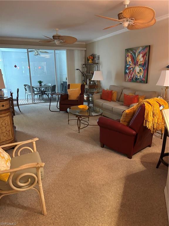 7108 Barrington Circle, Unit 101 Naples, FL 34108 - Photo 10 of 30 a living room with furniture a rug and white walls