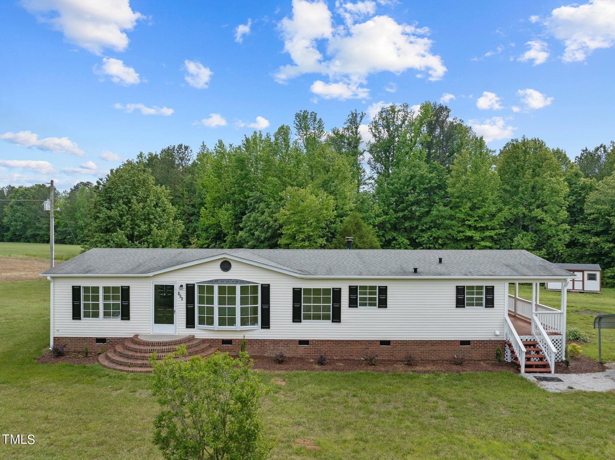 686 Carroll Town Road Macon, NC 27551 - Photo 1 of 51 1-web-or-mls-DJI_20240506160146_0335_D