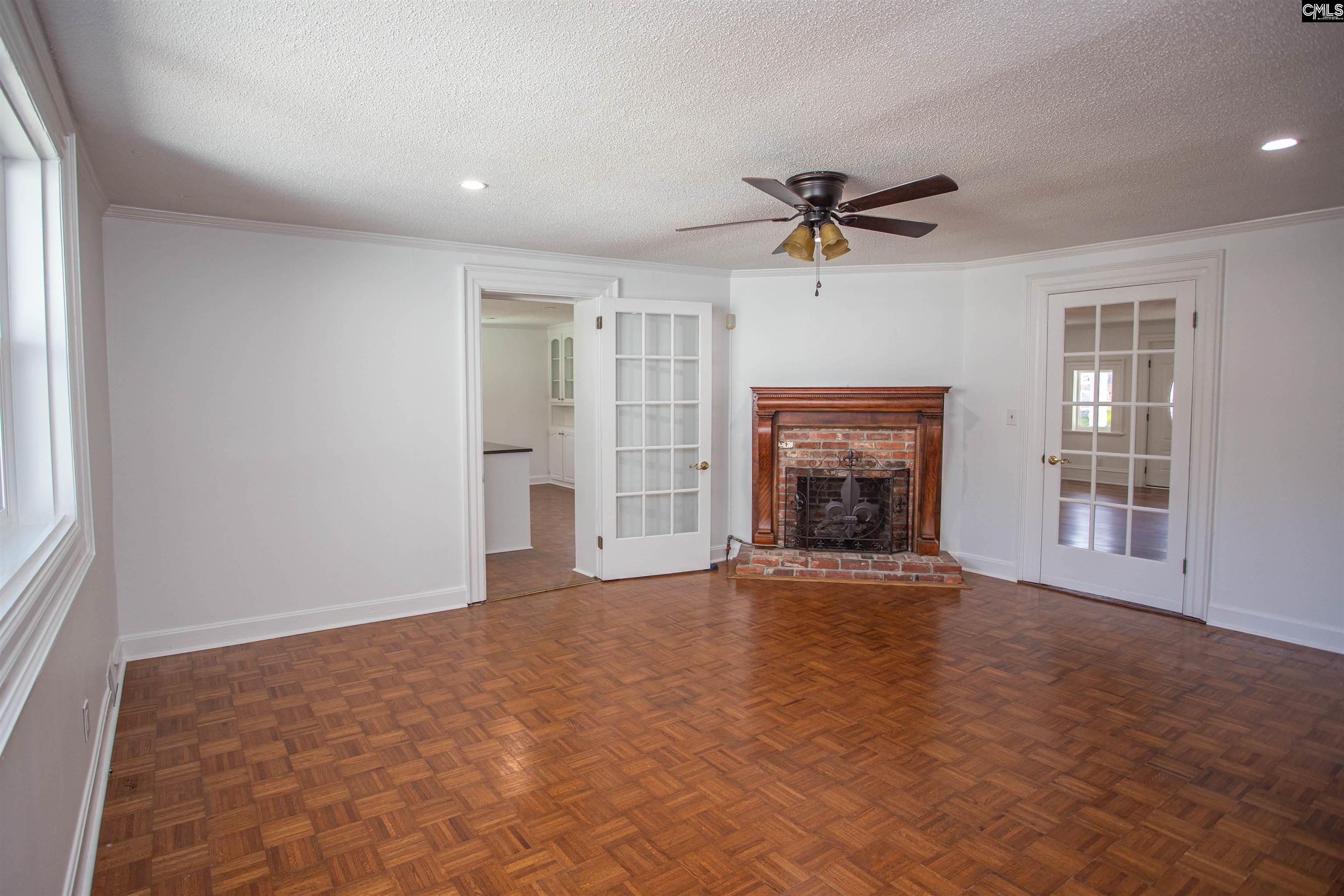 1700 Broad Street Camden, SC 29020 - Photo 12 of 41 an empty room with chandelier fan and windows