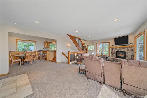 a view of a dining room with furniture window and outside view