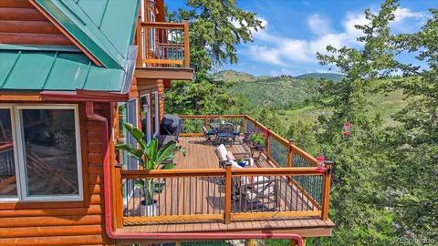 a view of a house with a tree