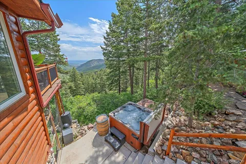 a view of a backyard with water fountain