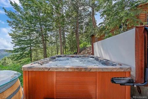 a view of a house with a fountain